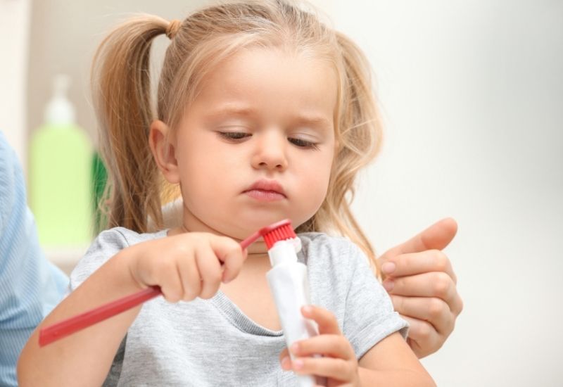 toddler brushing teeth struggle